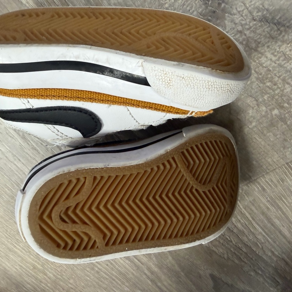 Nike Kids White, Black, and Gold Sneakers